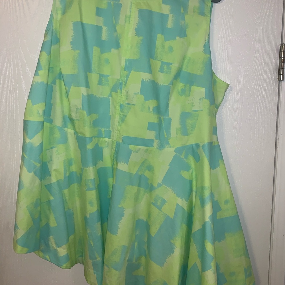 Asymmetrical sleeveless blouse